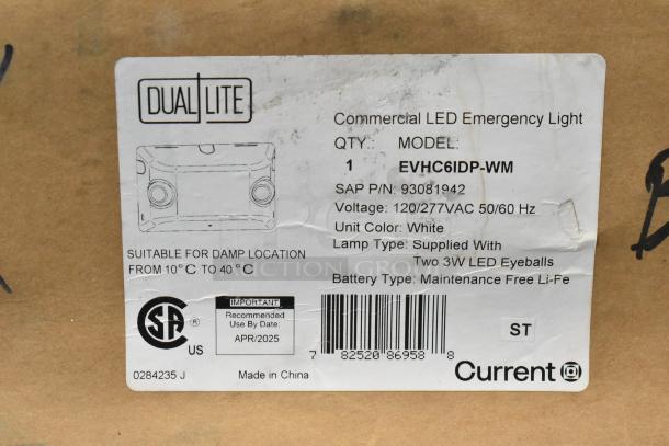 Dual-lite EVHC6IDP-WM Commercial LED Emergency Light label showing model, voltage, and specifications. New condition.