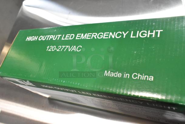 7 ASRLED-2-HL / TSR-W-REM emergency lights, new scratch and dent, in box. High output LED, 120-277VAC. Made in China.