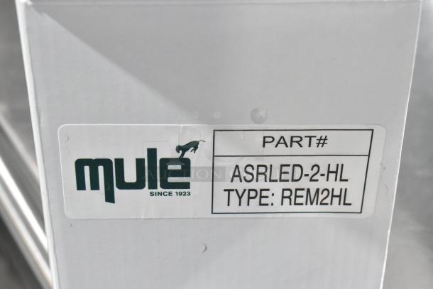 7 new emergency lights, model ASRLED-2-HL/TSR-W-REM, Mule brand. Scratch and dent. Part# label visible.