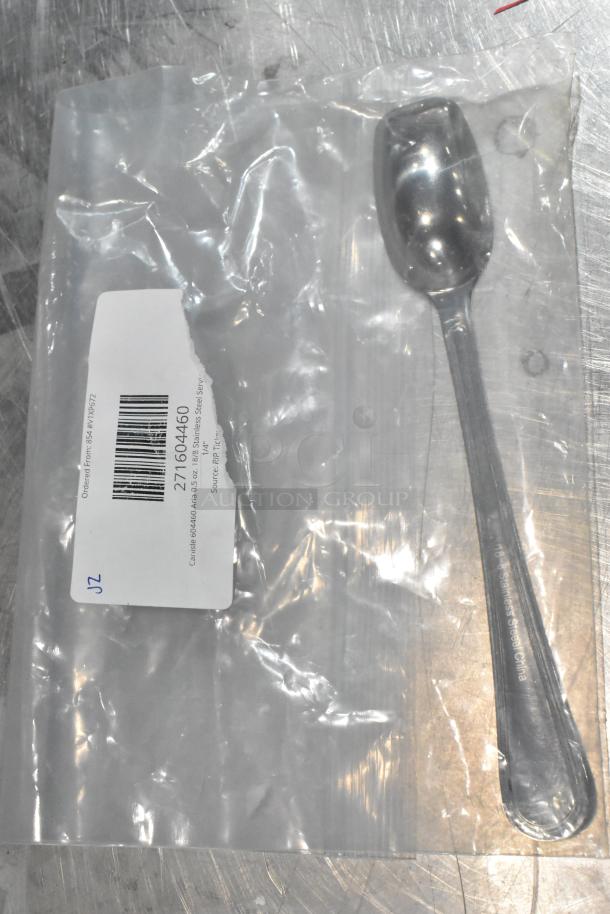Carlisle 604460 Aria 0.5 oz. stainless steel serving spoon in packaging, new with label showing model number.
