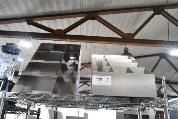 Two brand new scratch and dent metal lid organizers on shelf, nine compartments each, labeled "225 QTY X2".