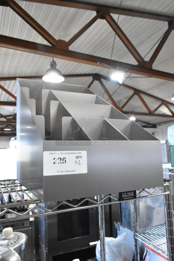 Brand new metal lid organizers, scratch and dent condition, multiple compartments, labeled with auction info.