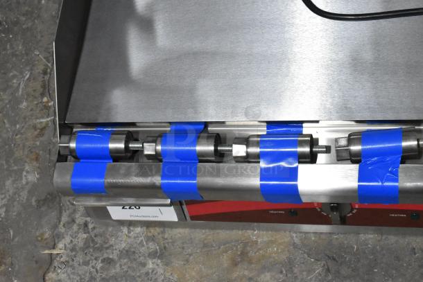 Brand new Avantco 177EG24N 24" electric countertop griddle, stainless steel, 208/240 volts, 1 phase, with scratch and dent.