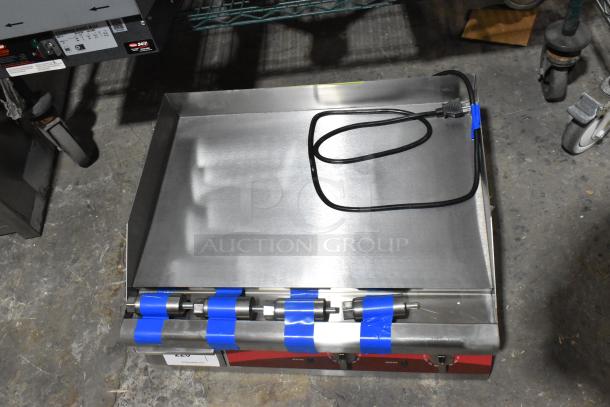 Brand new Avantco 177EG24N 24" stainless steel electric countertop griddle, 208/240V, taped for protection.