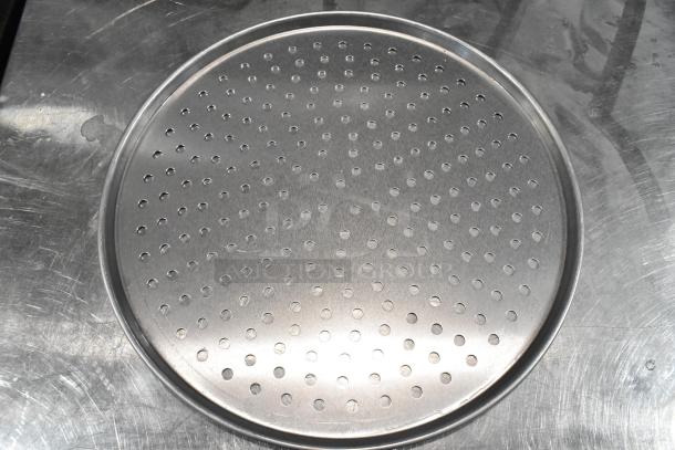Hobart HL80B metal round perforated baking screen, scratch and dent, brand new, for auction in a lot of 22 pieces.