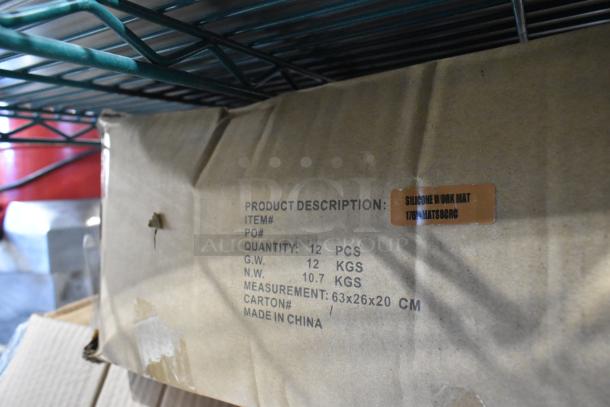 Two boxes of Baker's Mark BM176WMATSBCRC 36"x24" blue silicone mats, brand new, scratch and dent condition, 12 pieces each.