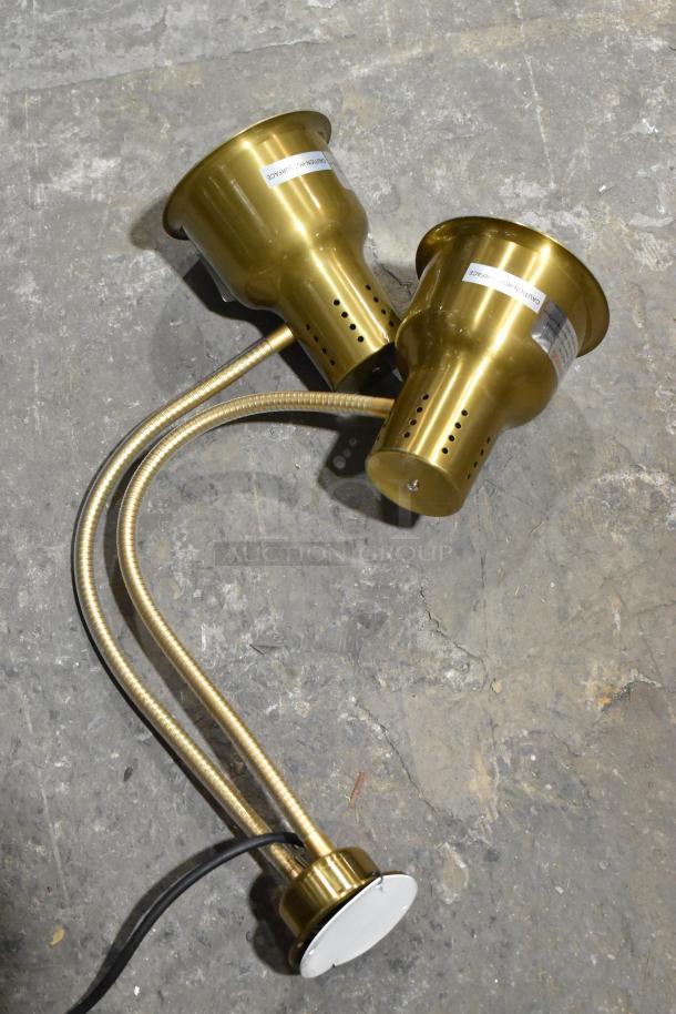 Hobart HL80B gold finish double head warming lamp, 115 volts, 1 phase, new with minor scratches; features flexible arms.