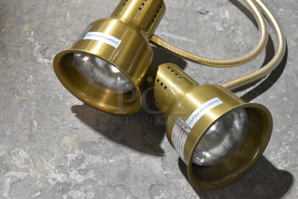 BRAND NEW Hobart CK7413B0696 gold finish double head warming lamp, 115V, 1 phase, caution labels visible. Model HL80B.