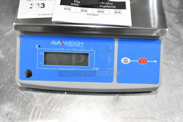AvaWeigh 334PC40OS 40 lb. digital portion control scale, oversized platform, brand new, minor scratches and dents visible.