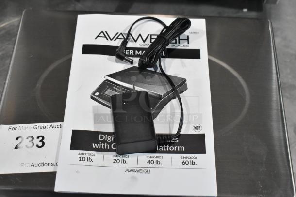 AvaWeigh 334PC40OS 40 lb. digital portion control scale, brand new, with oversized platform. Includes user manual and charger.