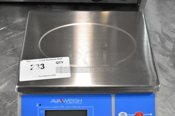 Brand new AvaWeigh 334PC40OS 40 lb. digital portion control scale with oversized platform; features sticker '233'.