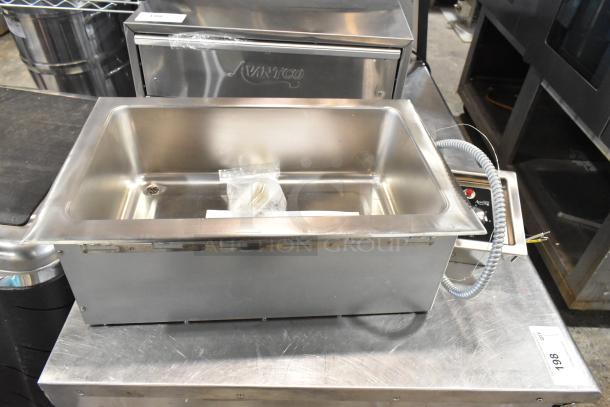 Brand new Avantco 177TM12H stainless steel hot food well, top mount, round corners, drain, 240V, 1 phase, minor scratches.