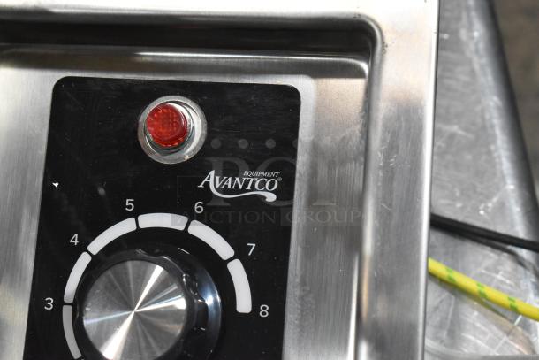 Avantco 177TM12H stainless steel hot food well control panel with a temperature dial and red indicator light.