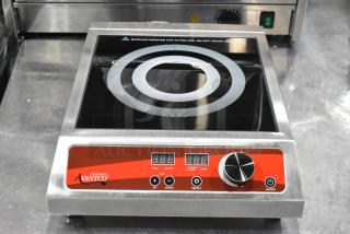 Brand new 2024 Avantco 177IC1800 stainless steel countertop induction cooker, 120V, with control panel, scratch and dent.