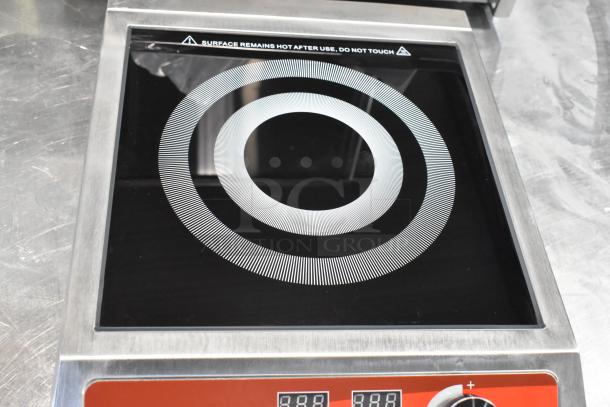 Avantco 177IC1800 induction cooker, new with scratches. Stainless steel, 120V, 1 phase. Warning: surface remains hot.