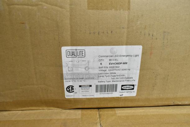 Box of 11 Dual Lite EVHC6IDP-WM commercial LED emergency lights, new, scratch and dent. Features include 120/277VAC, 3W LED.