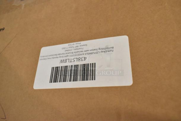 Label on cardboard box for Zurn Elkay LZSTL8WSLK 8 GPH Light Gray Hands-Free Filtered Bottle Filling Station, model 438lstl8w.
