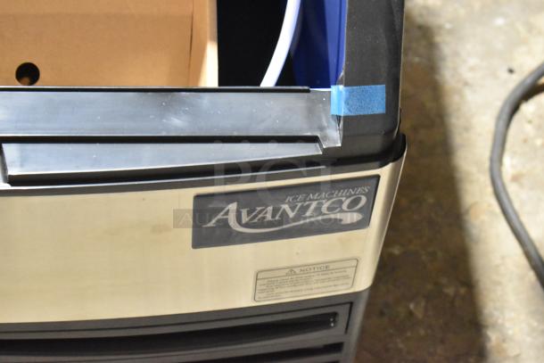 Stainless steel Avantco 194UCF280A ice machine, scratches visible, new condition, produces 299 lbs. of full cube ice.