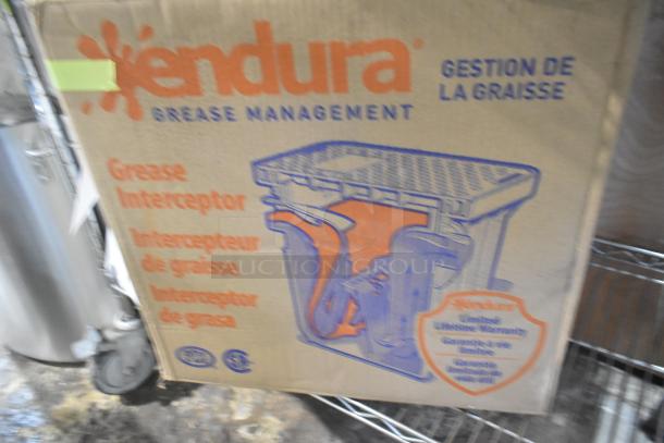 BRAND NEW Endura 4543907A02 Grease Trap, 14 lb., 7 GPM, 2" hub, scratch and dent condition. Box labeled with product details.