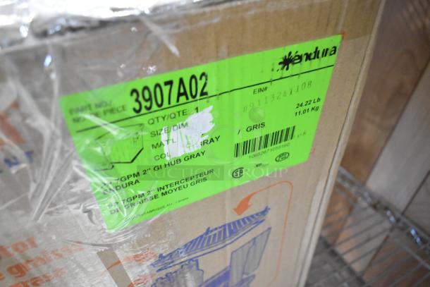 Brand new 14 lb. Endura grease trap, model 4543907A02, 7 GPM with 2" hub. Box marked "scratch and dent."