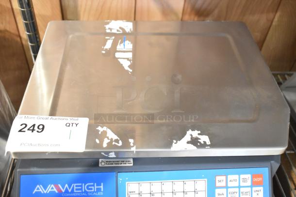 BRAND NEW AvaWeigh 334PCSP60 scale with scratches and dents, features thermal label printing, shows control panel and auction tag.
