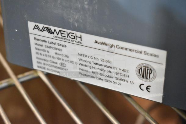 BRAND NEW AvaWeigh 334PCSP60 thermal label printing/price computing scale, max 60 lb, model label and specs visible.