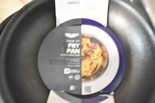 Vollrath Tribute 8" Tri-Ply Stainless Steel Fry Pan with CeramiGuard II Coating, black silicone handle, new condition.