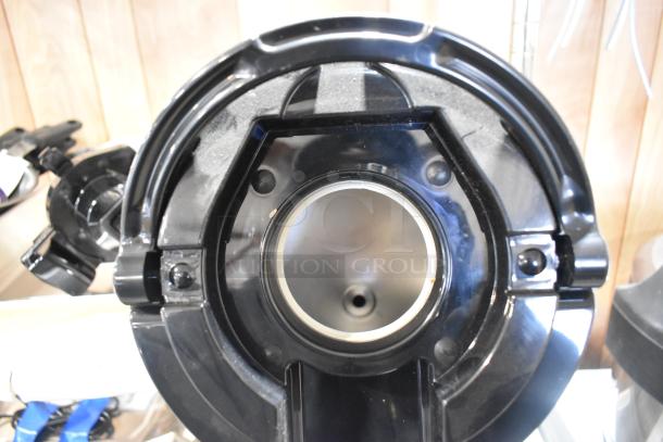 Alt text: Top view of a Fetco L4S-15 Luxus 1.5 gallon stainless steel coffee server interior, brand new condition.