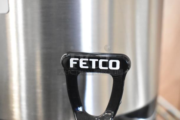 BRAND NEW SCRATCH AND DENT! Fetco L4S-15 Luxus 1.5 Gallon Stainless Steel Coffee Server, prominent Fetco logo.