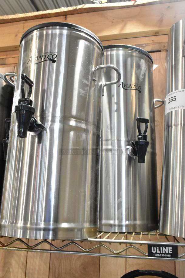 Two brand new Avantco iced tea dispensers, 3-gallon and 5-gallon, with stainless steel valves, minor scratches visible.