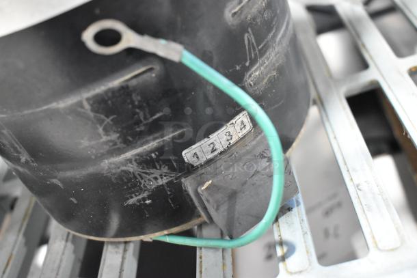 Interlink YSLB-300-6-B003 motor, 380/460V, 1-phase, visible labels, moderate wear, includes connecting wires.