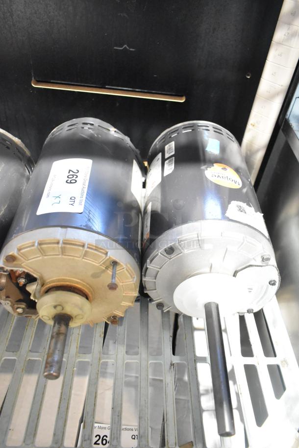 Two US Motors condenser motors, 208/230-480 volts, 3 phase, tags visible, good condition.