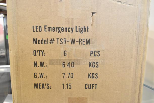 Cardboard box of TSR-W-REM LED Emergency Light, 6 pieces, 6.40 kg net weight, slight box damage visible.