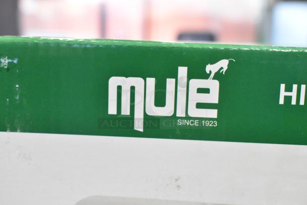 Mule branded box for TSR-W-REM Emergency Light, new with scratch and dent. Logo indicates "Since 1923." Green and white packaging.