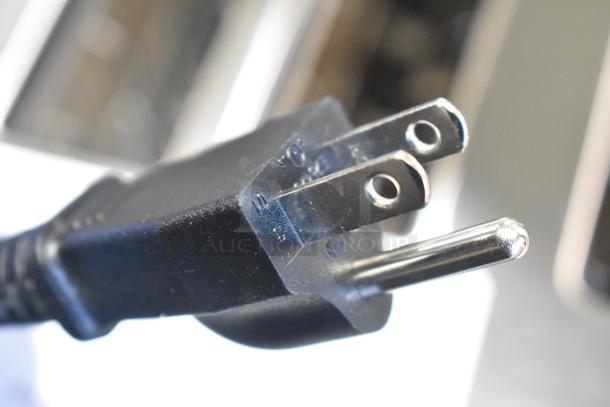 Power plug of the Cuisinart WST480 4 Slice Stainless Steel Toaster, brand new with minor cosmetic flaws.