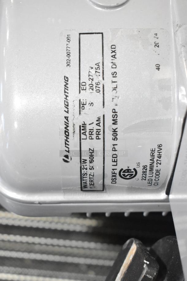 Lithonia Lighting LED fixture, 25W, 120-277V, with label showing model DSXF1 LED P1 50K MSP, in used condition.
