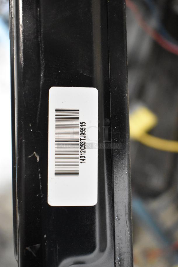 Barcode label on a black item from a mixed auction lot. Model: 14312C. Includes ballasts, condition visible.
