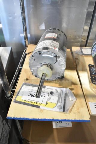 US Motors FK75 condenser fan motor, 208-230/460 volts, 3 phase, new on wooden pallet with labels and operating instructions.