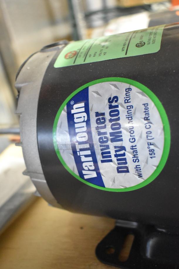 Two US Motors FK75 condenser fan motors, 208-230/460 volts, 3 phase. Features VariTough inverter duty, 158°F rated.