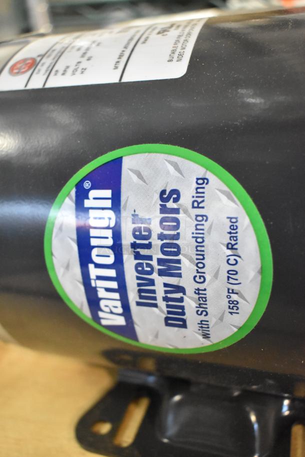 2 US Motors FK75 Condenser Fan Motor, 208-230/460V, 3 Phase, VariTough Inverter Duty, 158°F Rated, with labels shown.