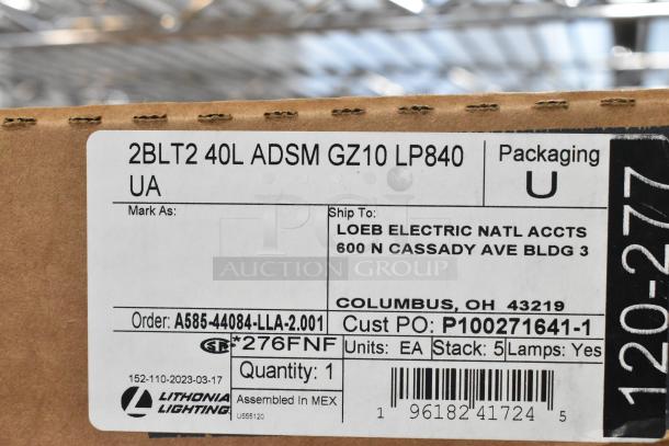 6 brand new Lithonia 2BLT4 40L LED Troffers, scratch and dent, with visible shipping label, model, and order details.