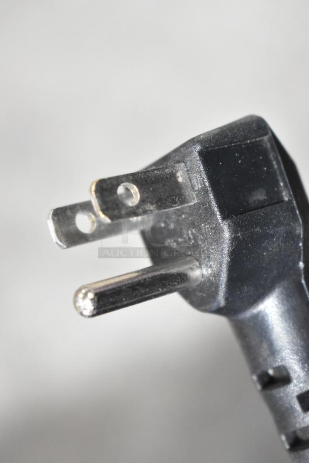 A close-up of a power plug for a Yukon YDD-1 Kegerator, indicating 115 volts, 1 phase usage.