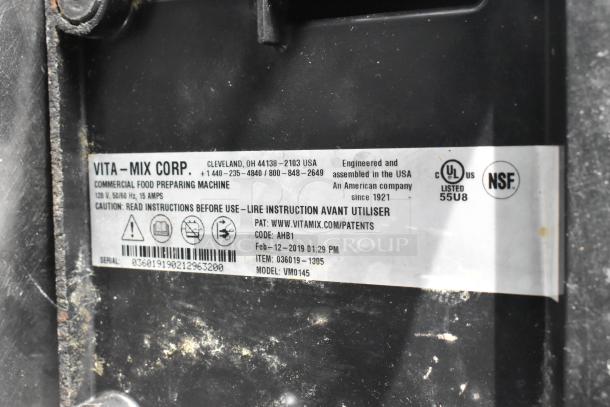 2019 VitaMix VM0145 metal countertop blender with clear dome enclosure. Label shows UL and NSF certifications, model VM0145.
