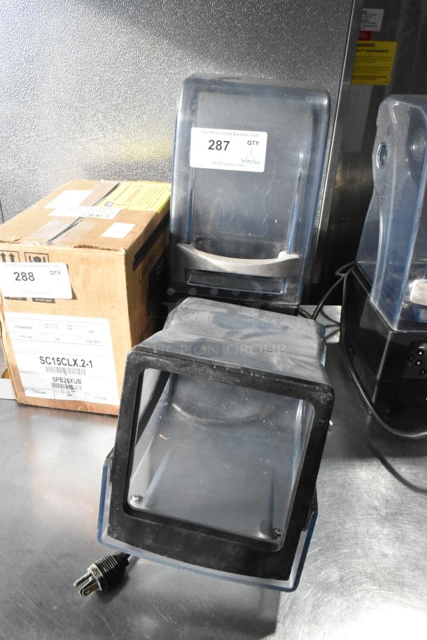 VitaMix VM0145 countertop blender, metal base, with 2 clear dome enclosures; shown with power cord, 120V, 1 phase.