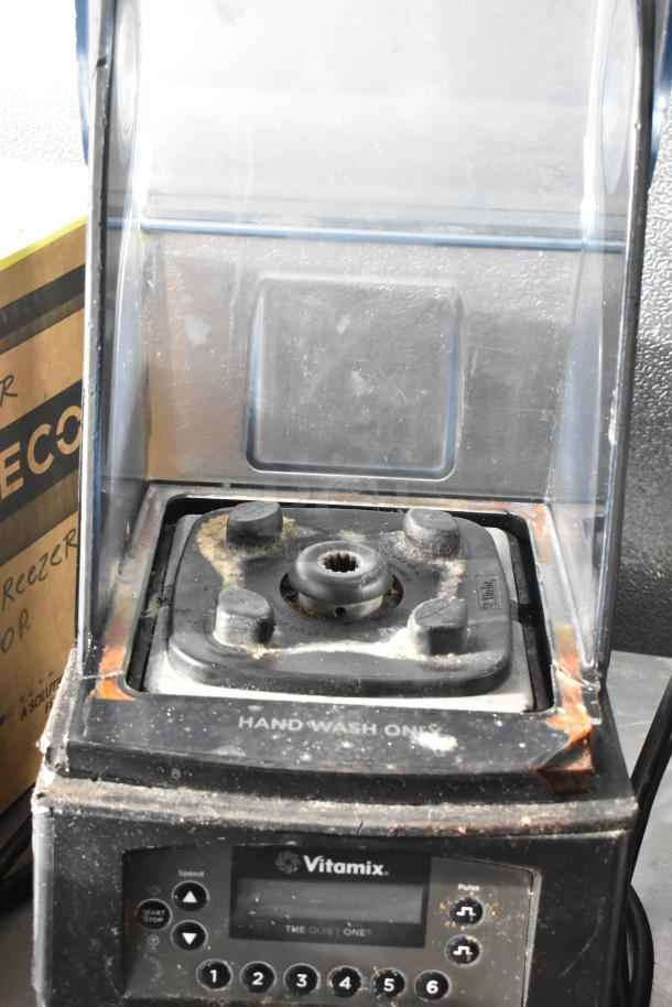 VitaMix VM0145 countertop blender with clear dome enclosure. Visible wear, requires hand wash. 120V, 1 phase.