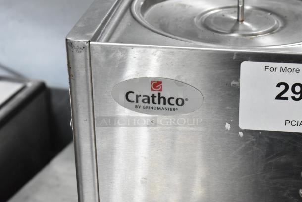 2018 Crathco D25-3 stainless steel cold beverage dispenser base, 115V, 1 phase, moderate wear, Crathco label visible.