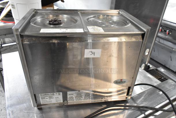 2018 Crathco D25-3 stainless steel beverage dispenser base, 115 volts, 1 phase. Visible wear and Crathco label.