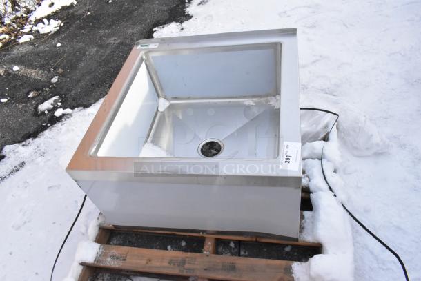 Brand new Regency 600SM242412 mop sink, 16-gauge stainless steel, 24"x24"x12" bowl. Minor scratches, visible tag.