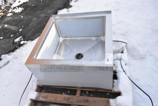 Brand new Regency 600SM242412 mop sink, 16-gauge stainless steel, 24"x24"x12" bowl. Minor scratches, visible tag.
