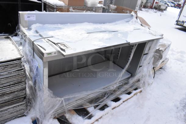 BRAND NEW SCRATCH AND DENT Regency 600EBTB2472R 24x72” 16 gauge stainless steel table with enclosed base, sliding doors, drawers, 6" backsplash.